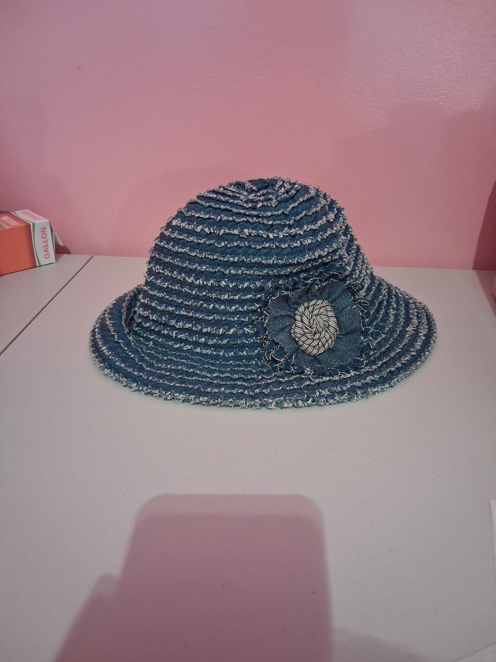 Frayed Denim Cloche Hat with Floral Accent